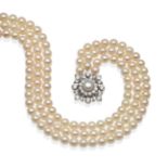 A Cultured Pearl Necklace, with a Pearl and Diamond Set Clasp, the triple strand of 50:52:56 uniform