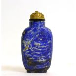 A Chinese Lapis Lazuli Snuff Bottle and Metal Stopper, Qing Dynasty, of flattened ovoid form, 6.