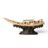 A Japanese Ivory Okimono as the Takarabune, Meiji period, the dragon boat with mother-of-pearl