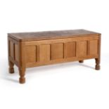 A Robert ''Mouseman'' Thompson Panelled Oak Blanket Box, on four octagonal and block feet, with
