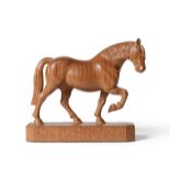 Stan ''Woodpecker'' Dodds (1928-2012): A Carved Horse, with raised foreleg, on a shaped