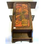 An Arts & Crafts Liberty & Co Oak Hanging Smoking Cabinet, the rectangular top over a door acid
