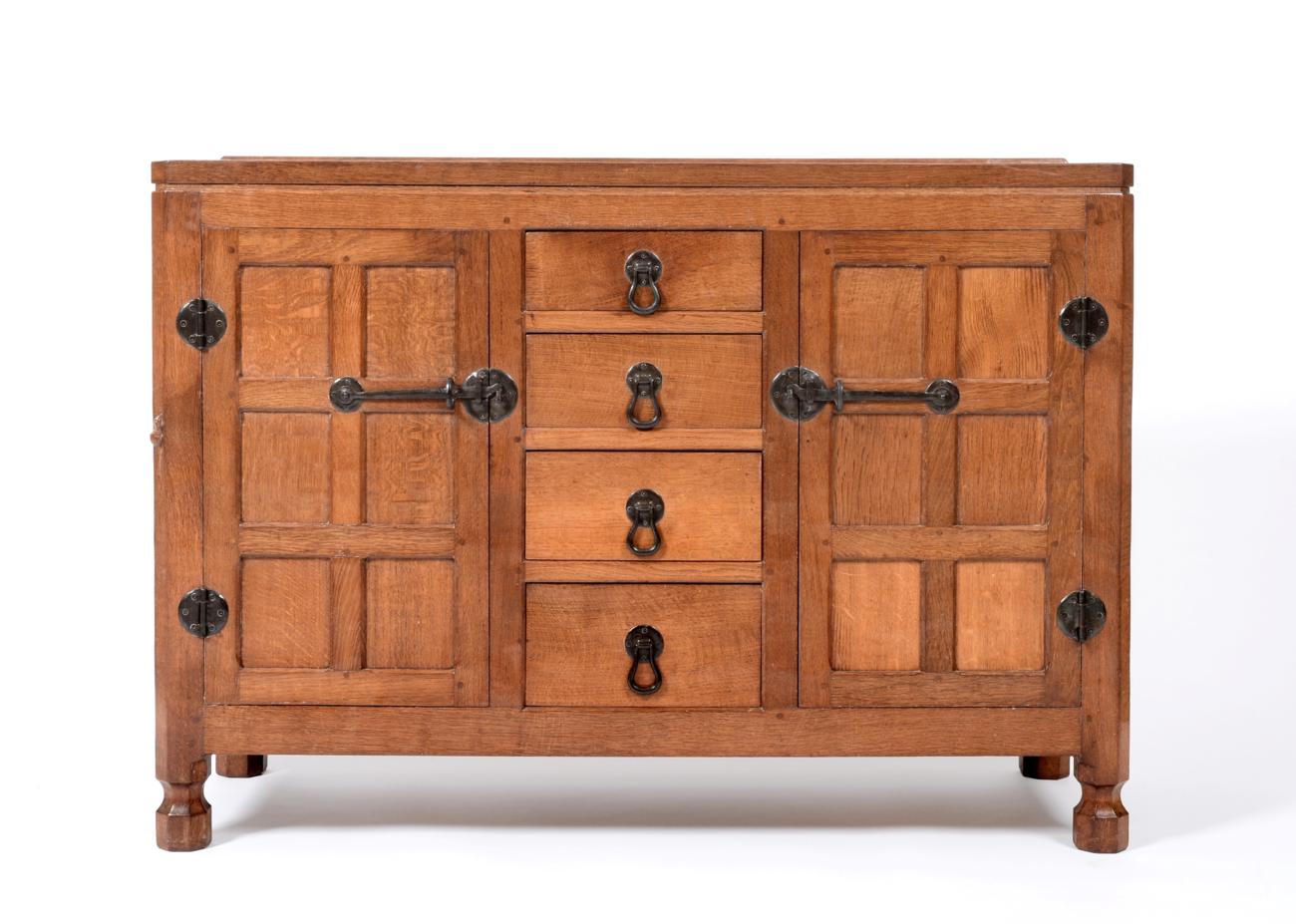 A Robert ''Mouseman'' Thompson Panelled Oak 4ft Sideboard, with raised upstand above four central