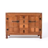 A Robert ''Mouseman'' Thompson Panelled Oak 4ft Sideboard, with raised upstand above four central