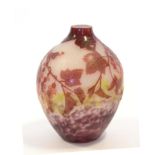 An André Delatte Cameo Glass Vase, in mottled green/purple overlaid with crimson, cut with hanging
