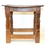 A Robert ''Mouseman'' Thompson Burr Oak Dish Top Stool, circa 1948, on four octagonal legs joined by