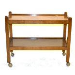 A Robert ''Mouseman'' Thompson Oak Tea Trolley, with two tiers both with raised sides joined by four