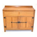 A Robert ''Mouseman'' Thompson Entertainment Cupboard, the rectangular top over double panelled