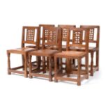 A Set of Six Robert ''Mouseman'' Thompson Oak Lattice Back Dining Chairs, with cow hide