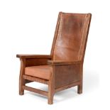 A Robert ''Mouseman'' Thompson Oak Smoker's Chair, with slung cow hide back and interwoven leather