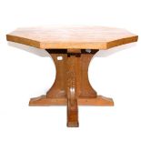 A Robert ''Mouseman'' Thompson Oak Octagonal Coffee Table, on a cruciform base, with carved mouse