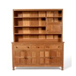 An Albert ''Eagleman'' Jeffray Oak Welsh Dresser, the open delft rack with three fixed shelves and a