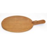 A Robert ''Mouseman'' Thompson Oak Large Chopping Board, with carved mouse signature, 46cm by