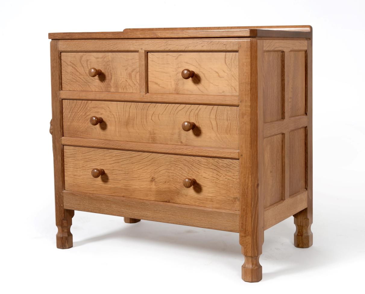A Robert ''Mouseman'' Thompson Oak Chest of Drawers, with raised upstand, above two short over two