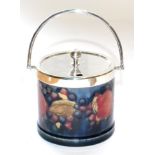 A William Moorcroft Pomegranate Pattern Preserve Pot, with plated rim, cover and swing handle, by