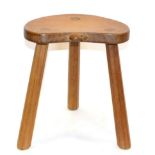 A Robert ''Mouseman'' Thompson Oak Calf Stool, on three octagonal legs, with carved mouse