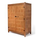 A Peter ''Rabbitman'' Heap Panelled Oak Wardrobe, with two doors, opening to reveal a rail and