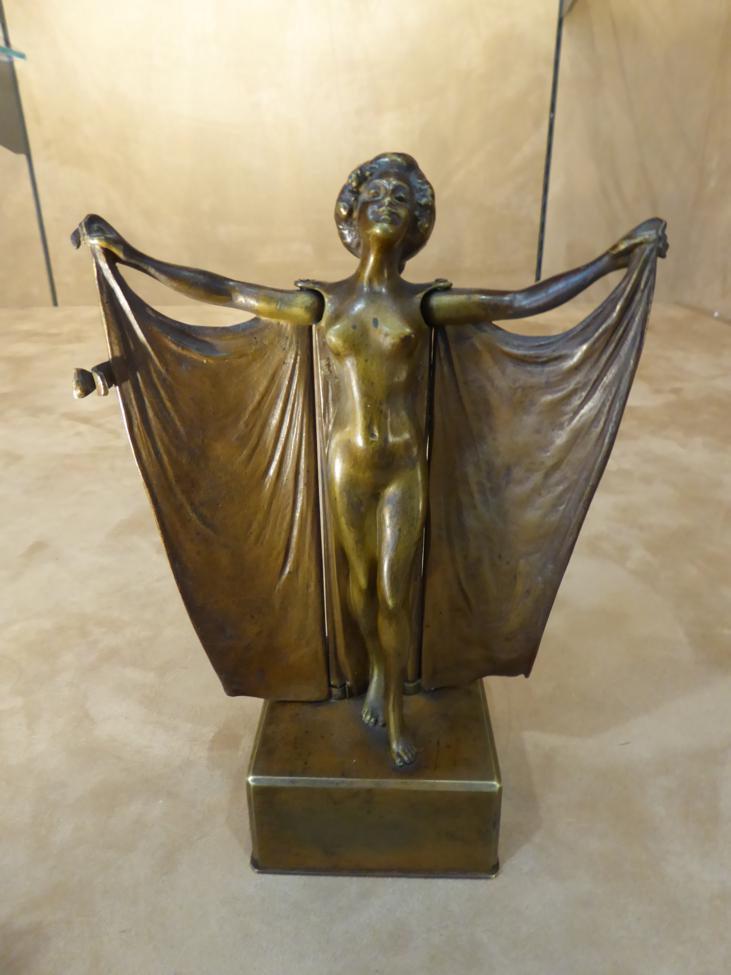 Carl Kauba (Austrian, 1865-1922): A Mechanical Gilt and Patinated Bronze Figure, modelled as a robed - Image 2 of 6