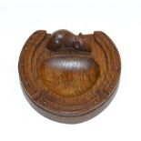 A Robert ''Mouseman'' Thompson Oak Horse Shoe Ashtray, with carved mouse signature, 12cm