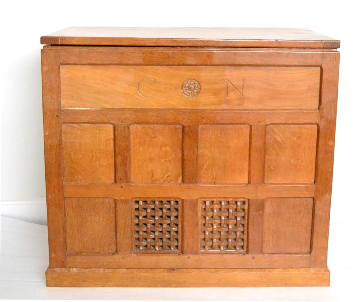 A Robert ''Mouseman'' Thompson Bespoke Panelled Oak Record Deck/Radio Cabinet, with lift up top