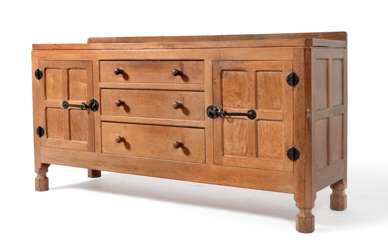 A Robert ''Mouseman'' Thompson Panelled Oak 5ft Sideboard, with raised upstand, above three