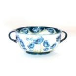 A William Moorcroft Macintyre Florian Ware Poppy Pattern Twin-Handled Bowl, circa 1903-4, in blue