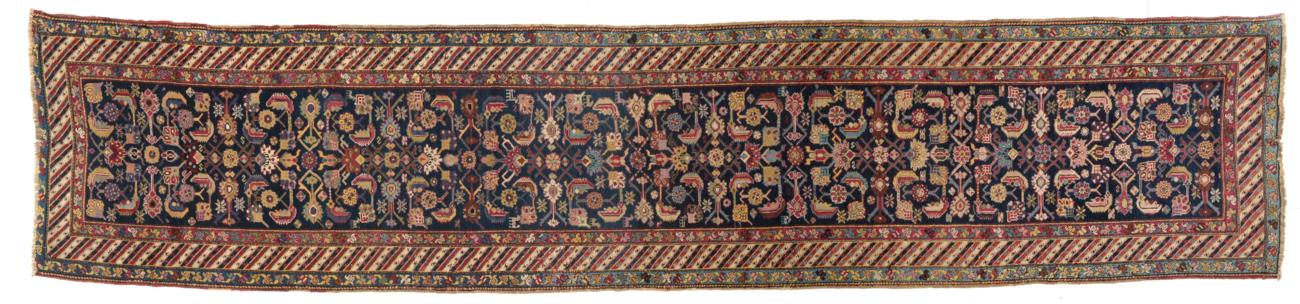 Fine 19th Century Narrow Karabagh Runner South Caucasus The deep indigo angular Herati field