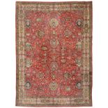 Tabriz Carpet Iranian Azerbaijan The blood red field with an allover design of large palmettes and