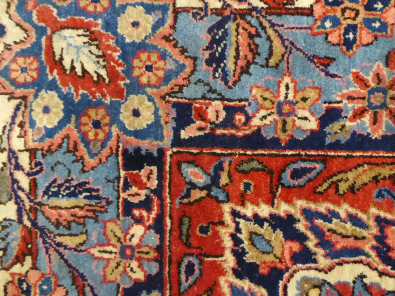 Good Kashan Carpet Central Iran the indigo field of floral vines around a cusped madder and ivory - Image 3 of 4