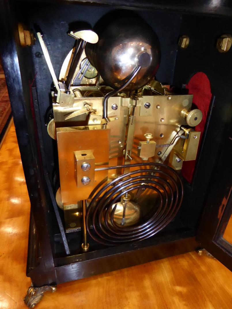 An Ebonised Chiming Table Clock, circa 1890, inverted bell top with urn finials, side carrying - Image 7 of 8