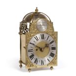 A Brass Lantern Wall Clock with Passing Strike, four posted case with pierced frets, single fusee