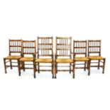 A Set of Six Rush-Seated Spindle Back Dining Chairs, 20th century, comprising four singles with