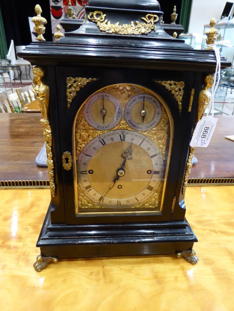 An Ebonised Chiming Table Clock, circa 1890, inverted bell top with urn finials, side carrying - Image 3 of 8