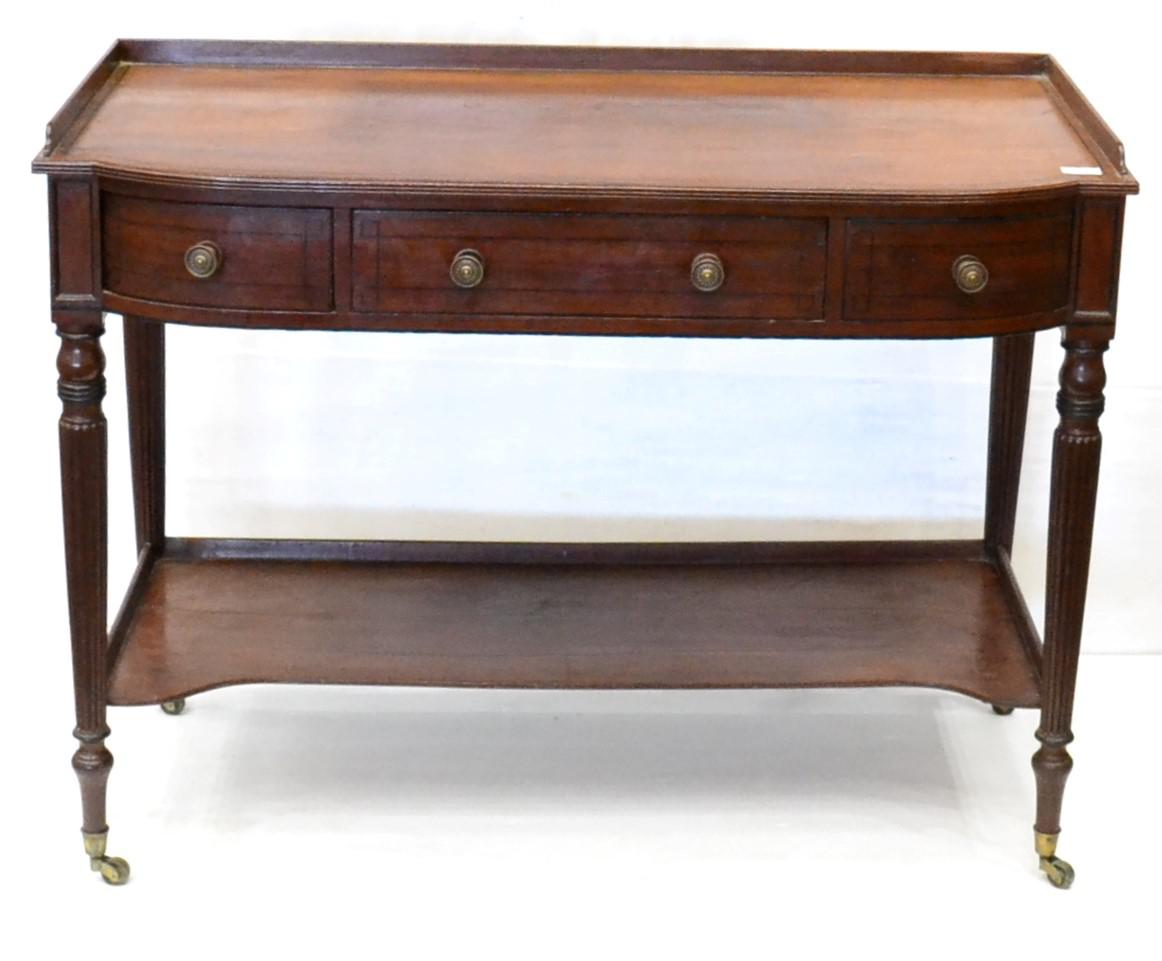 A Mahogany and Ebony Strung Washstand, in the manner of Gillows, early 19th century, of bowfront