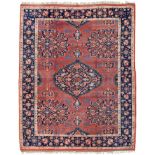 West Anatolian Carpet of 17th Century Ushak Design The madder field centred by a large indigo