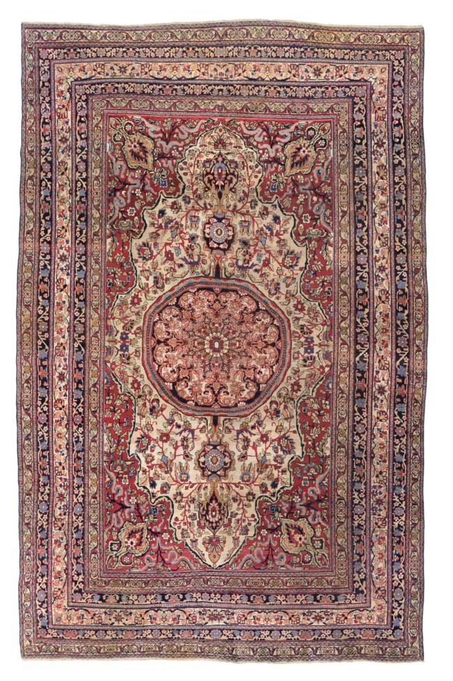 Late 19th Century Lavar Kirman Carpet South East Iran The cream field of flowering vines centred