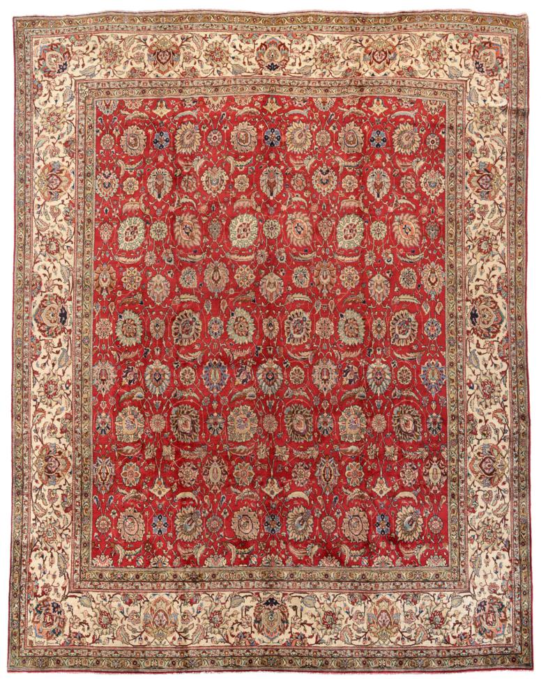 Tabriz Carpet of unusual size Iranian Azerbaijan The deep brick red field with an allover design