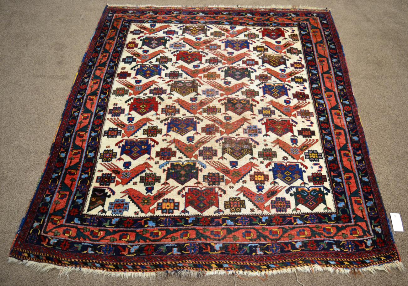 Unusual Afshar Rug South East Iran The cream field with a one way design of stylised birds and