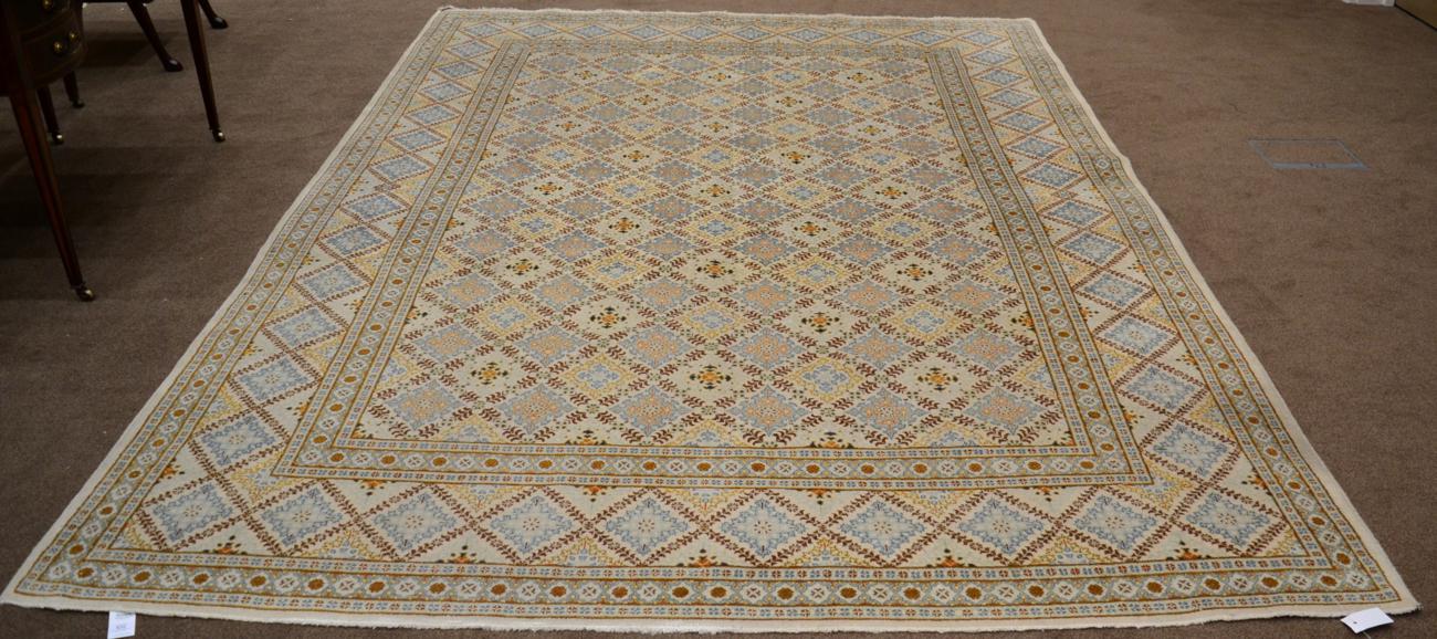 Kashan Carpet Central Iran The ivory diamond lattice field enclosed by similar borders and