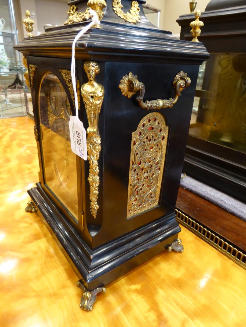 An Ebonised Chiming Table Clock, circa 1890, inverted bell top with urn finials, side carrying - Image 2 of 8