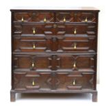 An Oak Geometric Moulded Straight Front Chest of Drawers, circa 1700, of two short over four long