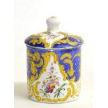 A Staffordshire Enamel Toilet Pot and Cover, circa 1770, of cylindrical form, painted with flower