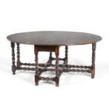 An Oak Six-to-Eight Seater Dropleaf Dining Table, circa 1700, with double gatelegs to form an