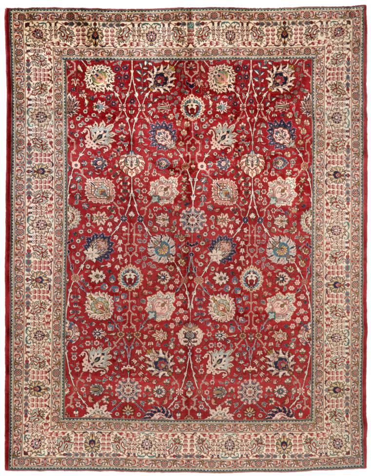 Tabriz Carpet Iranian Azerbaijan The brick red field of Shah Abbas design enclosed by ivory