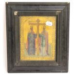 A Russian Icon, 19th century, painted with the Cross flanked by two saints on a gold ground with