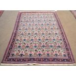 Finely Woven Veramin Rug Central Iran The ivory field with a one-way design of urns issuing