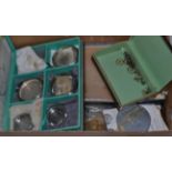 A quantity of International Watch Company pocket watch cases and related watch parts