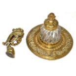 A late 19th century pierced brass inkwell with glass inkwell and a stylish gondola mount (2)