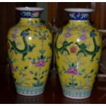 A pair of decorative Chinese yellow ground vases