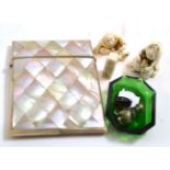 A mother of pearl card case, two early 20th century ivory netsuke and ivory seal, glass dish,